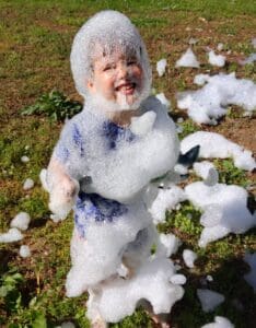Boy covered in bubbles at a foam party in charlotte how messy is a foam party
