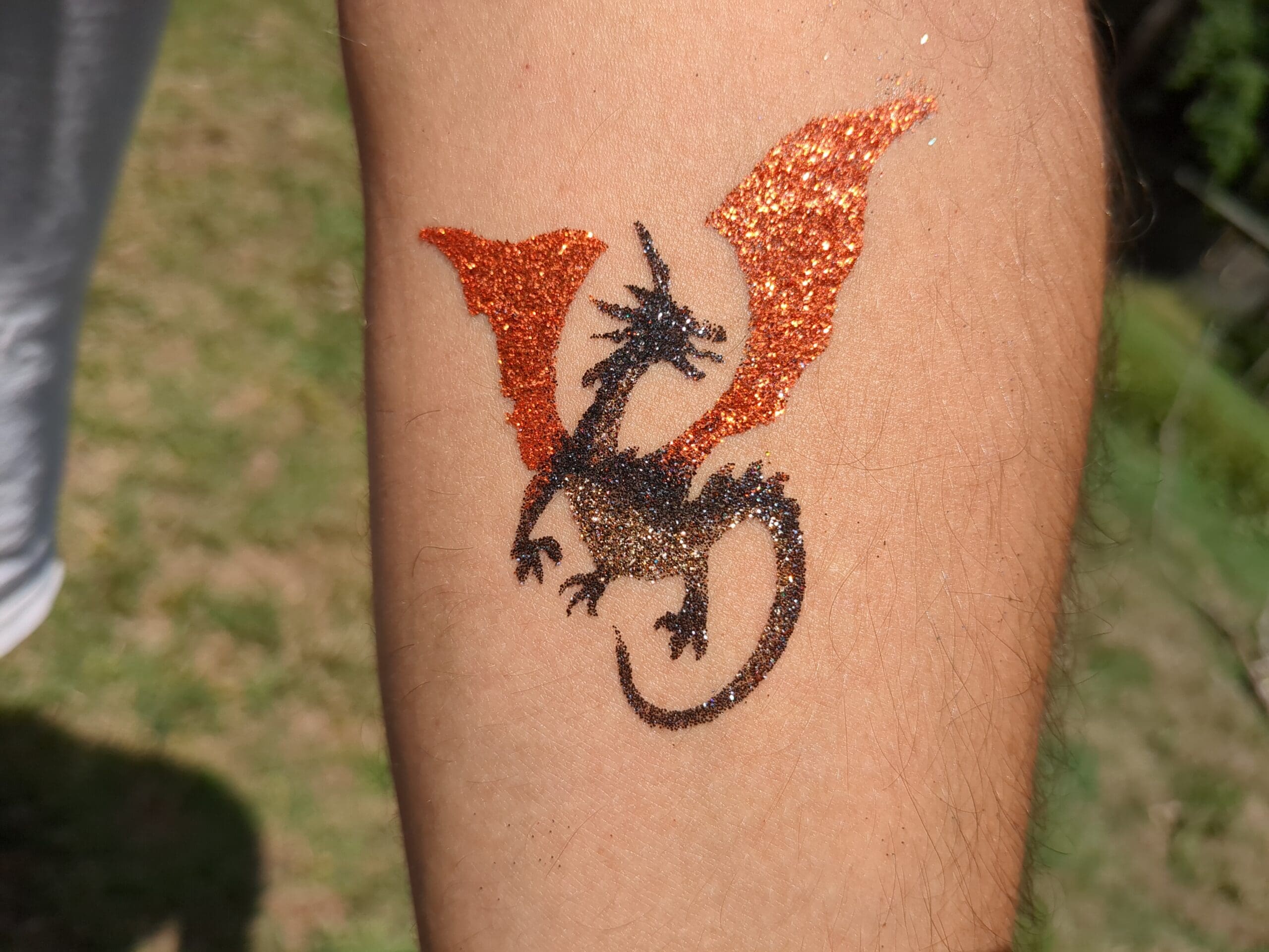 Black Dragon Glitter Tattoo - Made Ya Look Foam Party black and orange dragon glitter tattoo for birthday party events