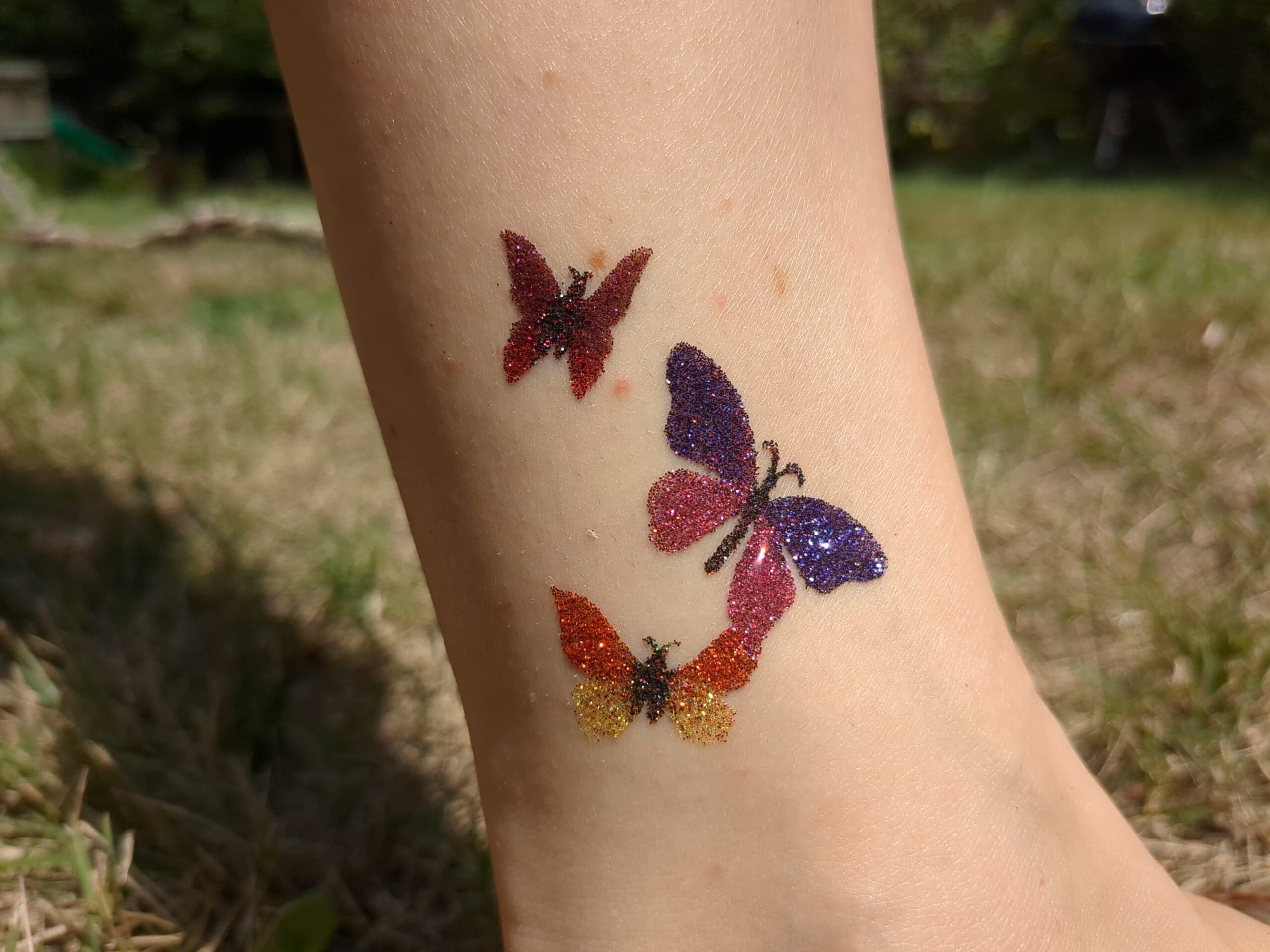 Butterflies Glitter Tattoo - Made Ya Look Foam Party butterfly ankle glitter tattoo by a local artist