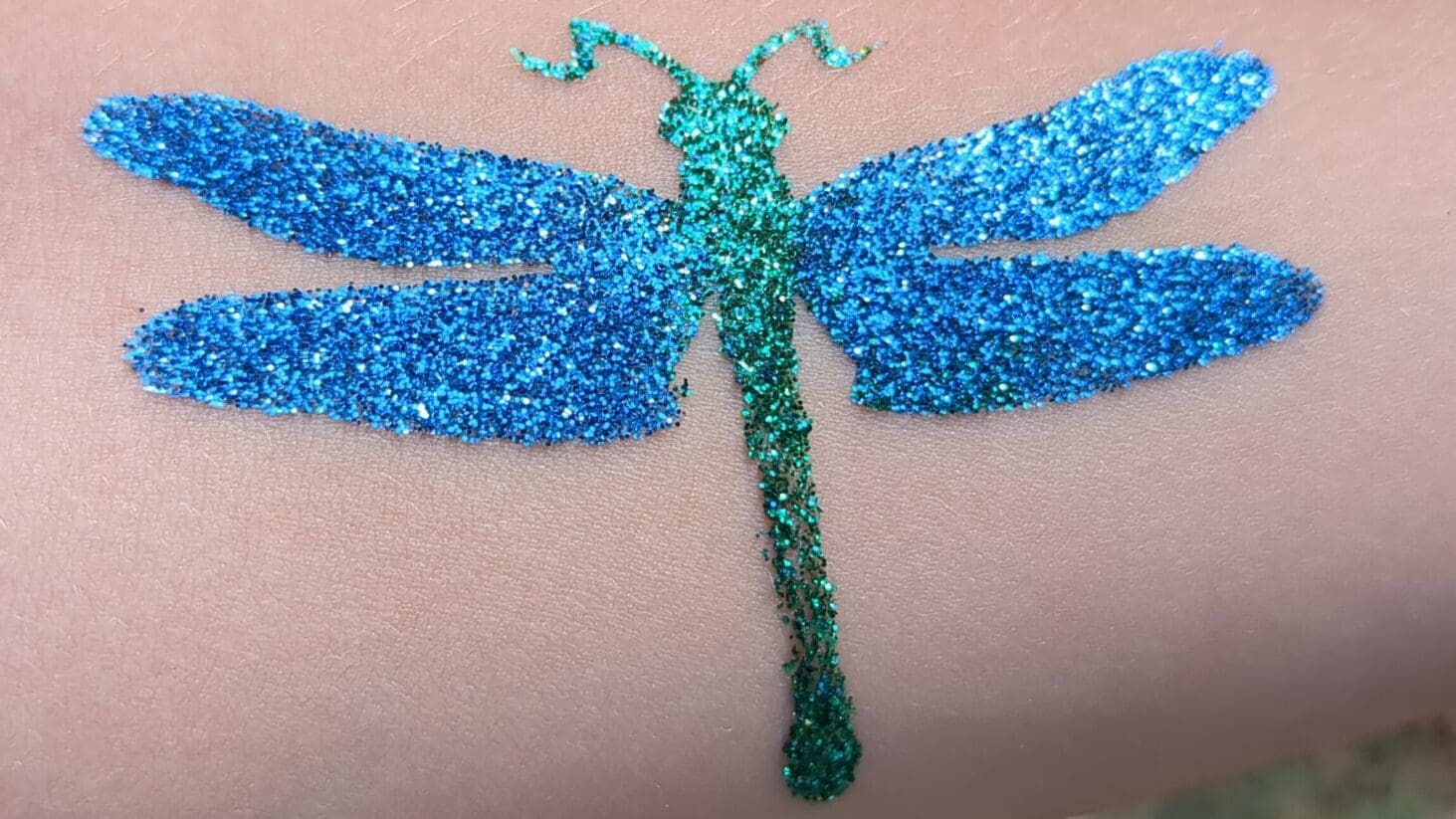 Dragonfly Glitter Tattoo - Made Ya Look Foam Party Blue and green dragonfly glitter tattoo at a charlotte nc party