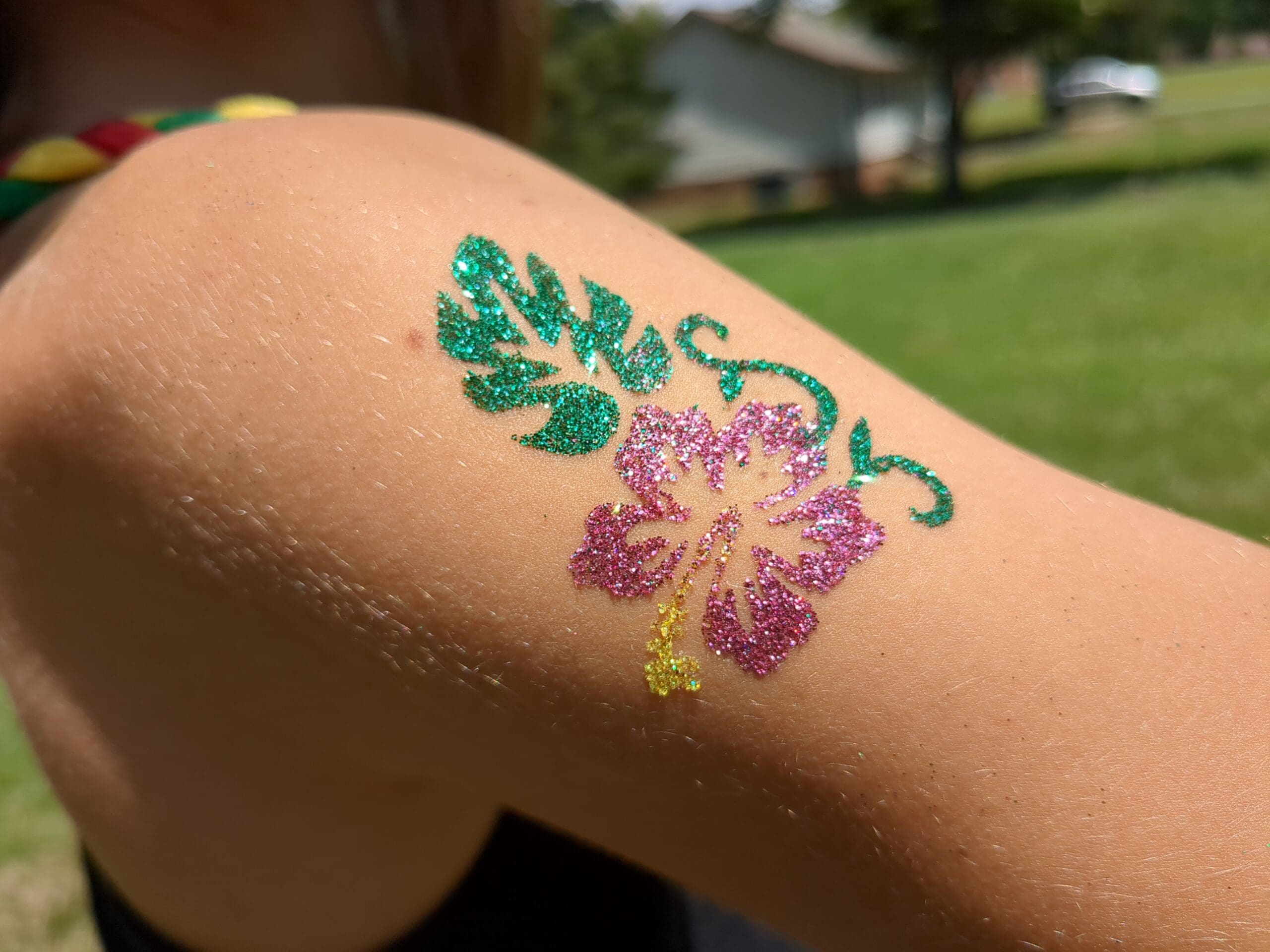 Flower Glitter Tattoo - Made Ya Look Foam Party purple and yellow flower glitter tattoo in Huntersville, nc
