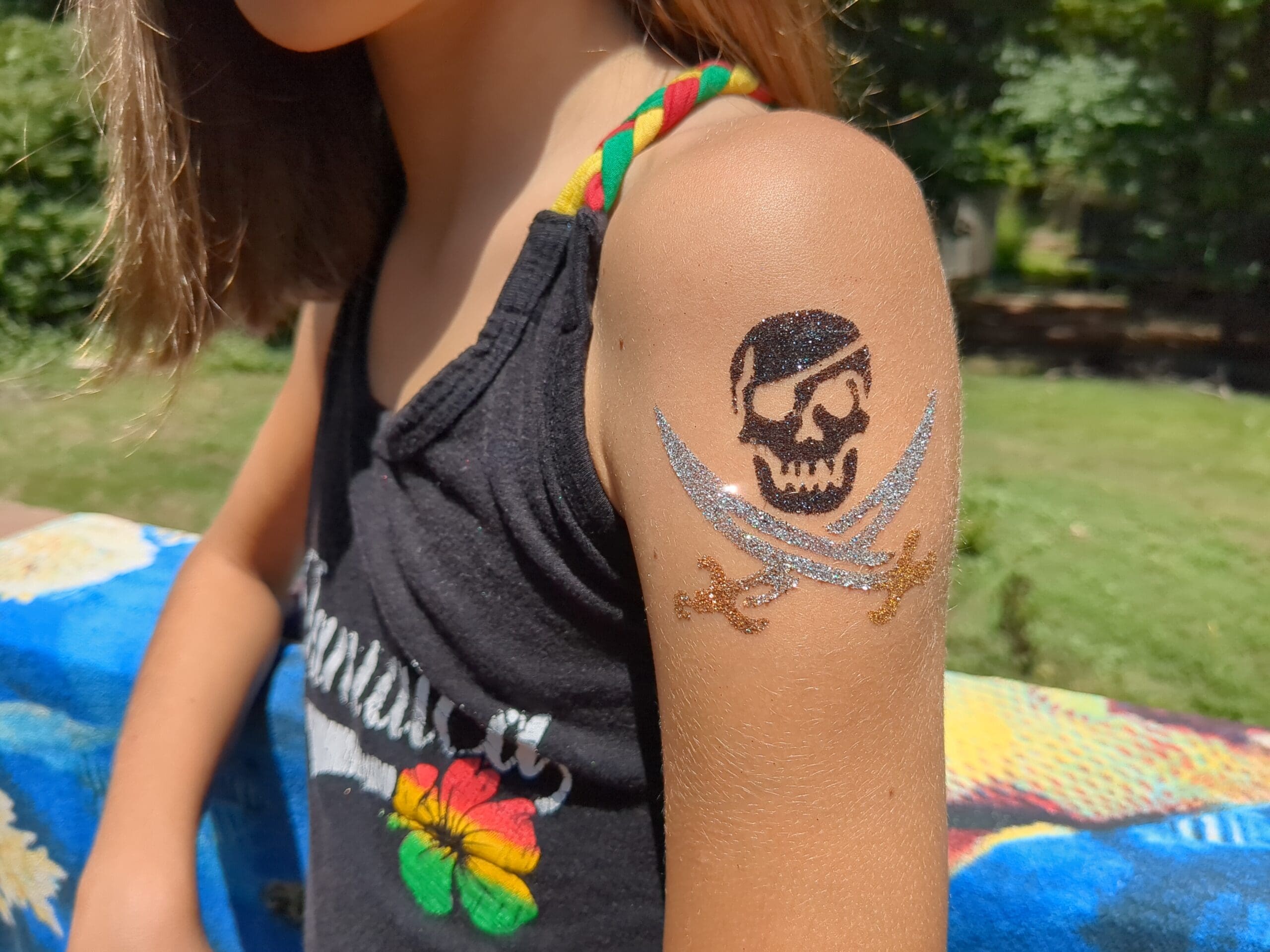 Jolly Roger Glitter Tattoo - Made Ya Look Foam Party jolly roger glitter tattoo on a shoulder in Mecklenburg county